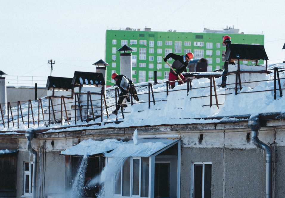 Photo by Sarazh Izmailov: https://www.pexels.com/photo/people-shoveling-snow-off-a-roof-11236043/