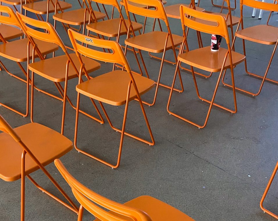 Photo by Ann Zzz: https://www.pexels.com/photo/yellow-folding-metal-chairs-on-the-ground-11078857/